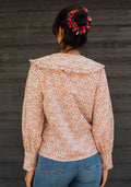 Blusa Cosmopolita Camelía