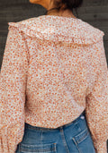 Blusa Cosmopolita Camelía